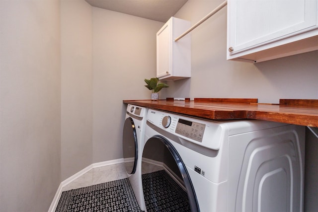 296 S 82nd St, West Des Moines, IA 50266 - laundry room featuring washer and dryer and cabinet space