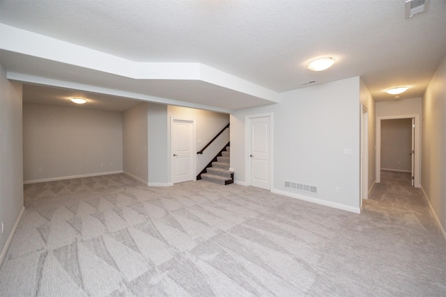 296 S 82nd St, West Des Moines, IA 50266 - finished below grade area with light carpet and stairway
