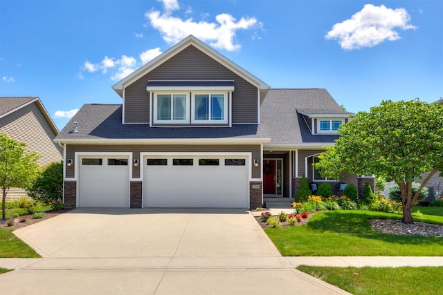 296 S 82nd St, West Des Moines, IA 50266 - craftsman inspired home featuring driveway, a front lawn, a shingled roof, and stone siding