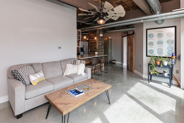 120 SW 5th St Unit 306, Des Moines, IA 50309 - living room with concrete floors and ceiling fan