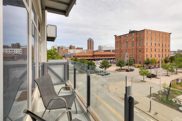 120 SW 5th St Unit 306, Des Moines, IA 50309 - balcony featuring a view of city