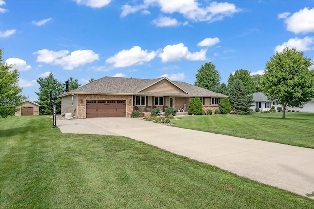 904 Pleasant St SE, Bondurant, IA 50035 - ranch-style home featuring a garage, a porch, a front lawn, concrete driveway, and stone siding