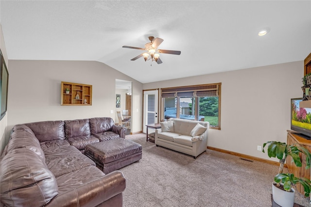904 Pleasant St SE, Bondurant, IA 50035 - carpeted living room featuring lofted ceiling and a ceiling fan