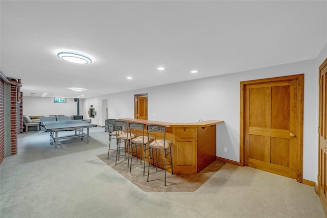 904 Pleasant St SE, Bondurant, IA 50035 - indoor bar featuring light colored carpet and recessed lighting