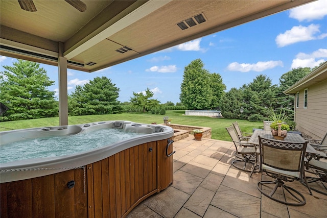 904 Pleasant St SE, Bondurant, IA 50035 - view of patio featuring a hot tub, outdoor dining area, and ceiling fan