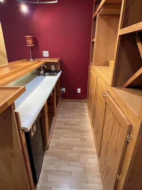 4806 Waller St, Ames, IA 50014 - bar featuring light wood-style floors and a sink