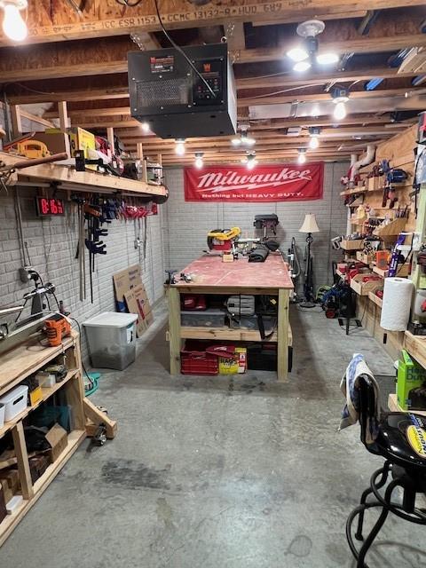 4806 Waller St, Ames, IA 50014 - unfinished basement with a workshop area and a heating unit