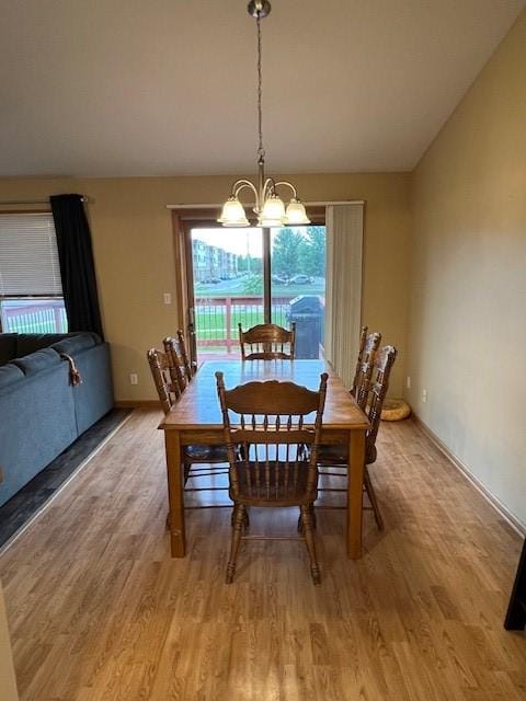 4806 Waller St, Ames, IA 50014 - dining area featuring a chandelier and light wood finished floors
