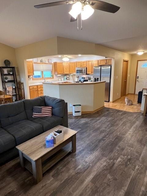 4806 Waller St, Ames, IA 50014 - living room with lofted ceiling, a ceiling fan, and wood finished floors