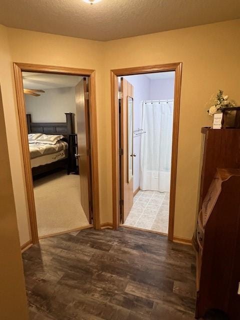 4806 Waller St, Ames, IA 50014 - hall featuring wood finished floors and a textured ceiling