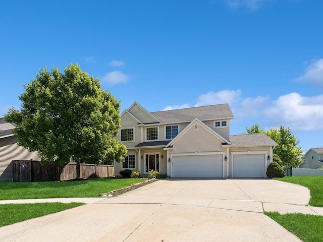 705 SE Whitetail Ln, Waukee, IA 50263 - view of front of property with a garage, driveway, and a shingled roof