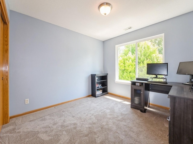 705 SE Whitetail Ln, Waukee, IA 50263 - carpeted home office featuring baseboards