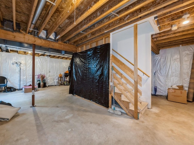 705 SE Whitetail Ln, Waukee, IA 50263 - unfinished below grade area featuring stairway