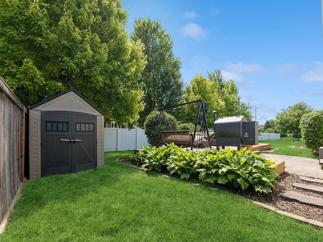 705 SE Whitetail Ln, Waukee, IA 50263 - fenced backyard with a storage unit and a hot tub