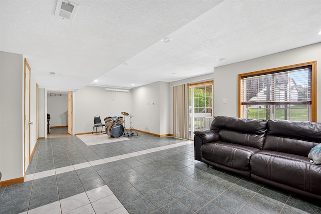 3413 Brook Run Dr, Des Moines, IA 50317 - living room with recessed lighting, a textured ceiling, and tile patterned flooring