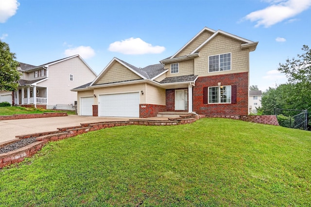 3413 Brook Run Dr, Des Moines, IA 50317 - view of front of property featuring brick siding, a garage, and driveway