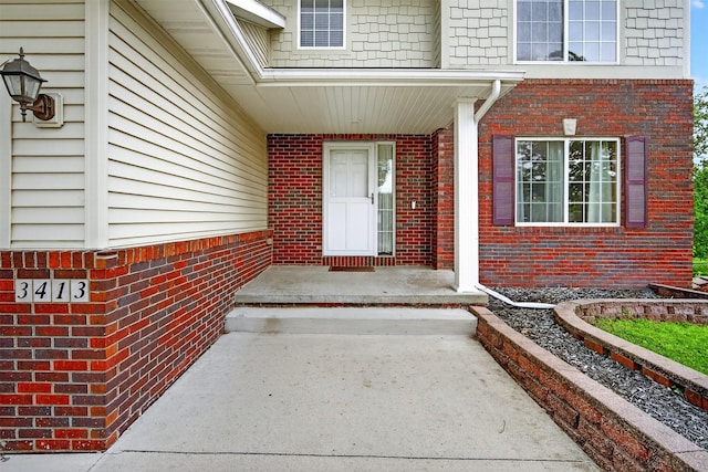 3413 Brook Run Dr, Des Moines, IA 50317 - doorway to property featuring brick siding