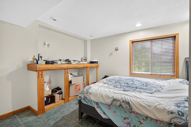 3413 Brook Run Dr, Des Moines, IA 50317 - bedroom featuring recessed lighting, tile patterned flooring, and a textured ceiling