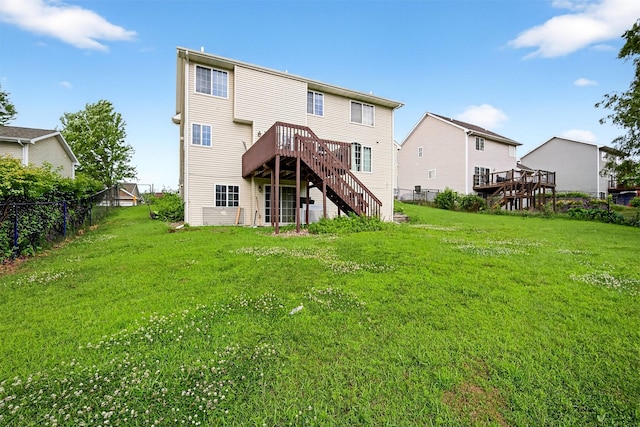 3413 Brook Run Dr, Des Moines, IA 50317 - rear view of house featuring stairway and a wooden deck