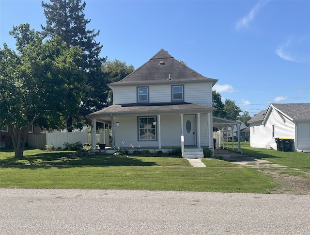 117 W Broadway St, Colfax, IA 50054 - view of front facade with driveway, a porch, roof with shingles, and a carport