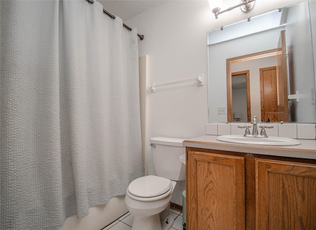 5420 SW 13th St, Des Moines, IA 50315 - full bathroom featuring vanity, tile patterned floors, and shower / bathtub combination with curtain