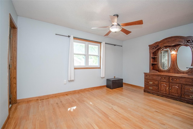5420 SW 13th St, Des Moines, IA 50315 - unfurnished bedroom featuring wood finished floors and ceiling fan