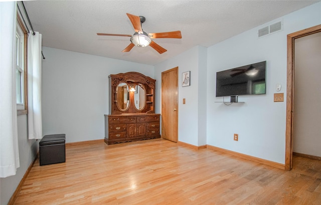 5420 SW 13th St, Des Moines, IA 50315 - unfurnished bedroom featuring wood finished floors and ceiling fan