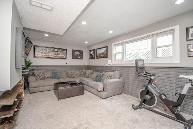 5420 SW 13th St, Des Moines, IA 50315 - carpeted living area featuring recessed lighting and a textured ceiling