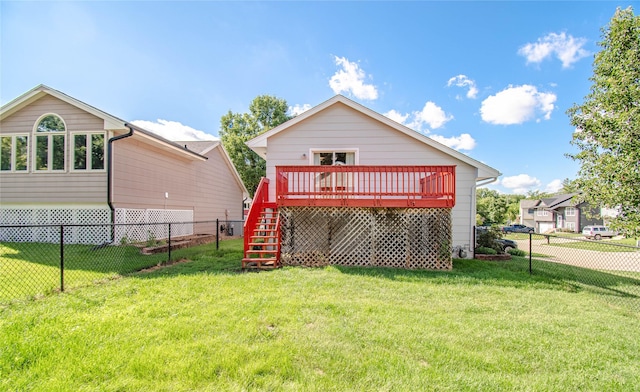 5420 SW 13th St, Des Moines, IA 50315 - back of property with stairway, a deck, and a fenced backyard