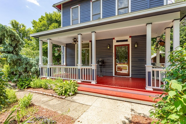 658 20th St, Des Moines, IA 50314 - view of exterior entry with a porch and ceiling fan