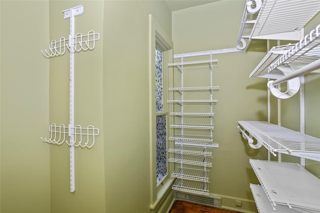 658 20th St, Des Moines, IA 50314 - spacious closet with wood finished floors