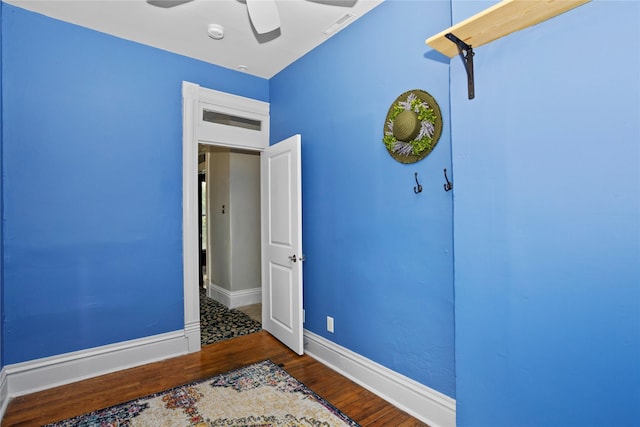 658 20th St, Des Moines, IA 50314 - unfurnished bedroom featuring wood finished floors and a ceiling fan