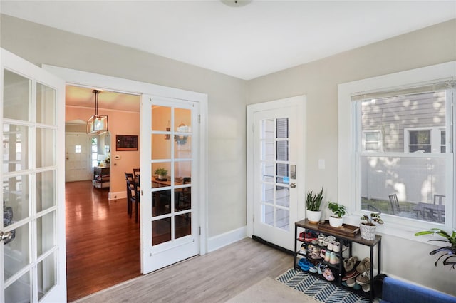 618 Arthur Ave, Des Moines, IA 50313 - entryway featuring french doors and wood finished floors
