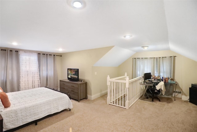 618 Arthur Ave, Des Moines, IA 50313 - bedroom with carpet flooring, a desk, and vaulted ceiling