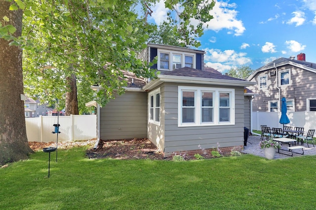 618 Arthur Ave, Des Moines, IA 50313 - rear view of house with a patio