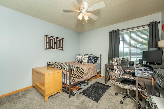 550 25th St SE, Altoona, IA 50009 - bedroom with carpet, a desk, a textured ceiling, and a ceiling fan