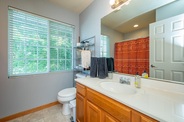 550 25th St SE, Altoona, IA 50009 - bathroom with vanity, tile patterned floors, and curtained shower