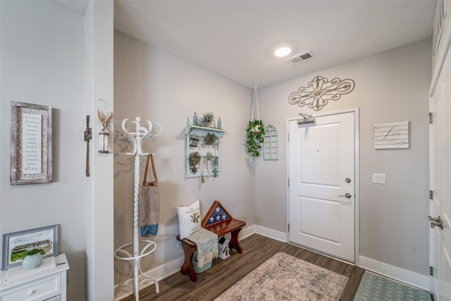 9065 Bishop Dr Unit 314, West Des Moines, IA 50266 - entrance foyer with dark wood finished floors and baseboards