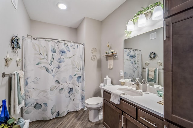 9065 Bishop Dr Unit 314, West Des Moines, IA 50266 - bathroom with wood finished floors, vanity, and curtained shower
