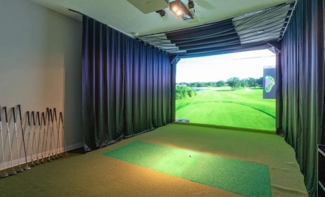 9065 Bishop Dr Unit 314, West Des Moines, IA 50266 - rec room with golf simulator and carpet floors