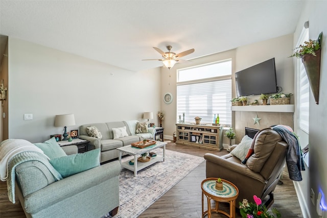 9065 Bishop Dr Unit 314, West Des Moines, IA 50266 - living area featuring a ceiling fan and wood finished floors