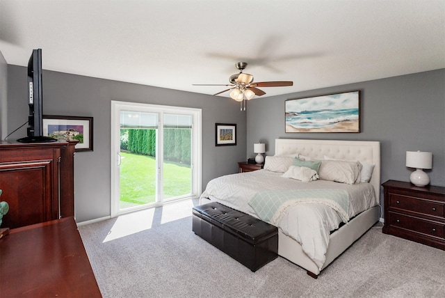 2507 135th St, Urbandale, IA 50323 - carpeted bedroom with access to exterior and ceiling fan