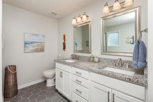 2507 135th St, Urbandale, IA 50323 - full bathroom featuring double vanity and tile patterned flooring