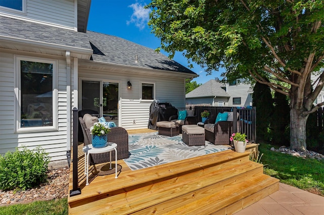 2507 135th St, Urbandale, IA 50323 - wooden deck with an outdoor living space and area for grilling