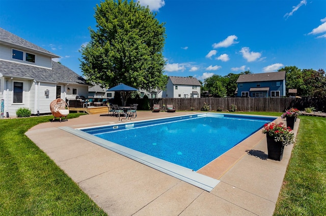 2507 135th St, Urbandale, IA 50323 - view of pool with a fenced backyard, a residential view, a deck, a patio area, and outdoor dining area