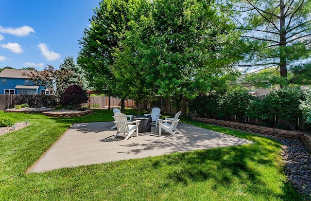 2507 135th St, Urbandale, IA 50323 - fenced backyard featuring a patio and an outdoor fire pit