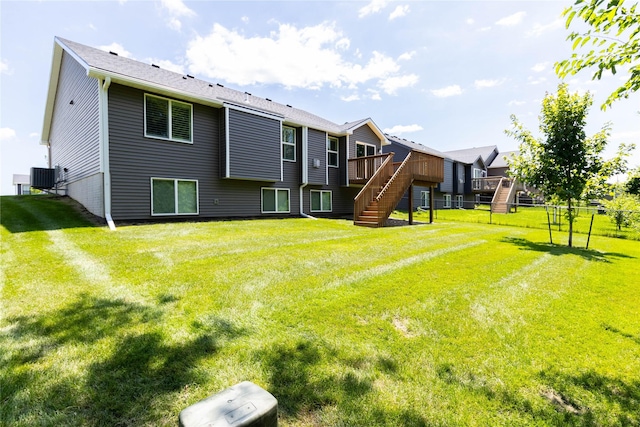 2529 SE Integra Ave, West Des Moines, IA 50265 - back of house with stairs and a wooden deck
