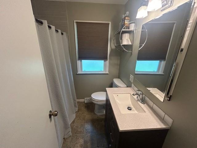 3412 Crestmoor Pl, Des Moines, IA 50310 - bathroom with vanity, a shower with shower curtain, and tile patterned flooring