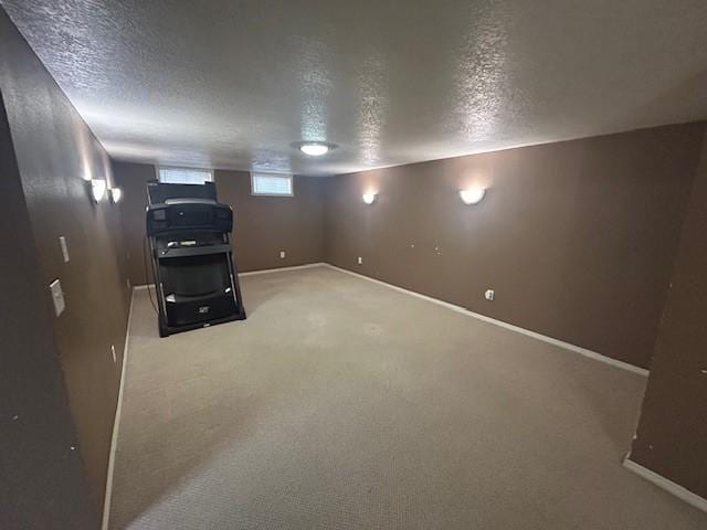3412 Crestmoor Pl, Des Moines, IA 50310 - basement featuring a textured ceiling and carpet flooring