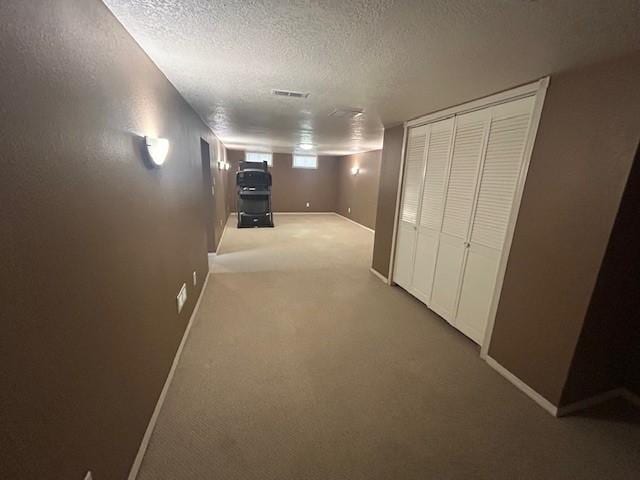 3412 Crestmoor Pl, Des Moines, IA 50310 - hall featuring a textured ceiling and light carpet